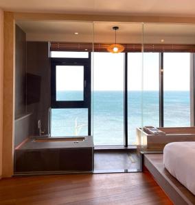 One fine day Jeju Poolvilla客房内的一张或多张床位