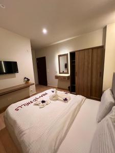 Postel nebo postele na pokoji v ubytování Amigo Pyramids Hotel