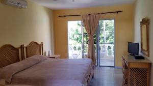 Postel nebo postele na pokoji v ubytování Hotel Voramar + 37 fotografií