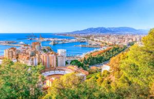 an aerial view of a city and a river at Hostal NV Airport in Málaga