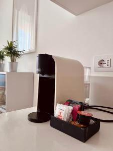 a black box sitting on top of a counter at Baldo Design Apartment - Rome - MA - Vatican in Rome