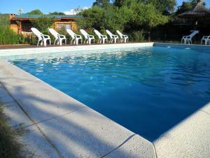 Swimmingpoolen hos eller tæt på Cabañas Mandala
