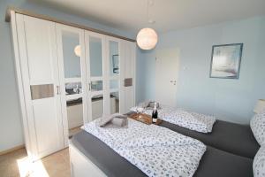 En eller flere senge i et værelse på Weitblick