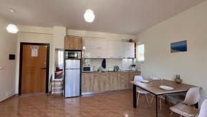 Kuchyň nebo kuchyňský kout v ubytování Marina Apartment