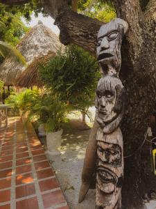 Κήπος έξω από το Surfer Grill, Alojamiento en puerto Colombia, Pradomar, Habitación Tulum