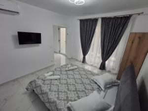 Postel nebo postele na pokoji v ubytování Casa Niko