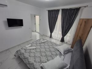 Postel nebo postele na pokoji v ubytování Casa Niko