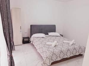 Postel nebo postele na pokoji v ubytování Casa Niko