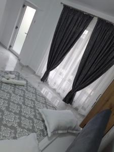 Postel nebo postele na pokoji v ubytování Casa Niko