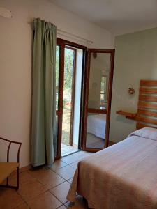 Postel nebo postele na pokoji v ubytování Carmen House