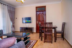 TV a/nebo společenská místnost v ubytování Spring Apartments & Suites