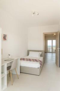 Ένα ή περισσότερα κρεβάτια σε δωμάτιο στο Maison 46 Luxury Accomodation