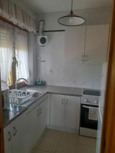 Kuchyň nebo kuchyňský kout v ubytování Chalet en el Orbigo
