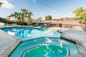 Πισίνα στο ή κοντά στο 5BR Oasis with Pool, Arcade, Sauna