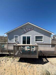 Ein Balkon oder eine Terrasse in der Unterkunft Sand Spur Cottages
