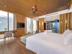 Postel nebo postele na pokoji v ubytování Beachfront Villa 3-bedroom - Breakfast buffet