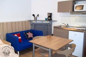 Η κουζίνα ή μικρή κουζίνα στο Les appartements Cook +55 φωτογραφίες
