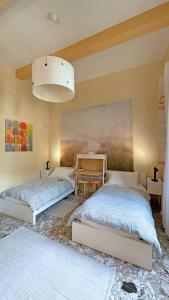 Postel nebo postele na pokoji v ubytování Three Rooms