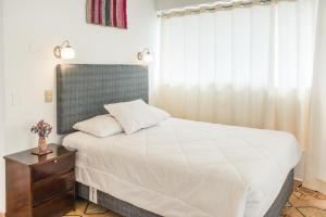 Postel nebo postele na pokoji v ubytování Sueños del Valle Sagrado