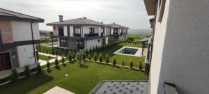 an aerial view of a house with a yard at selimpiya villaları in Silivri +3 photos