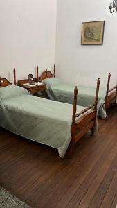 Postel nebo postele na pokoji v ubytování Casa Rosa 8