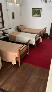Postel nebo postele na pokoji v ubytování Casa Rosa 8