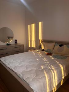 Ένα ή περισσότερα κρεβάτια σε δωμάτιο στο Jon's Apartment