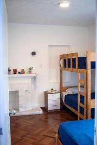 Postel nebo postele na pokoji v ubytování Gutierrez Hostel