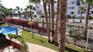 The swimming pool at or close to Otylia La Calma Sun Apartment With Sea View