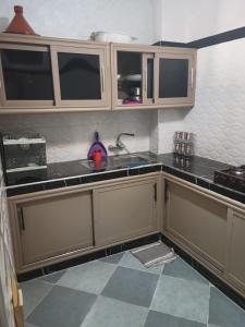 Kuchyň nebo kuchyňský kout v ubytování Atlas Homes