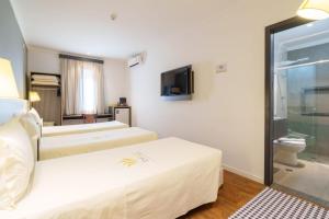 Koupelna v ubytování Uniclass Hotel Pinheiros