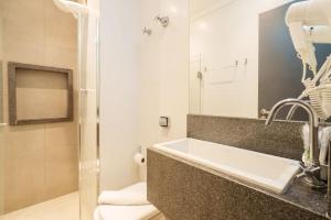 Koupelna v ubytování Uniclass Hotel Pinheiros