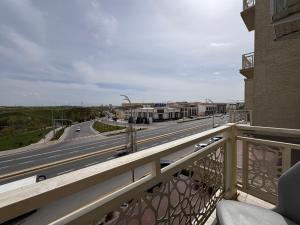 a balcony with a view of a highway at Samarkand Premium Apartment 2 in Samarkand