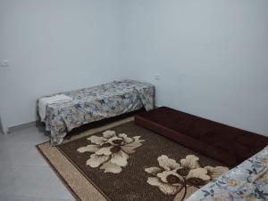 Postel nebo postele na pokoji v ubytování Maison Essid kelibia