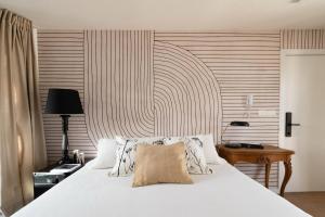 Ένα ή περισσότερα κρεβάτια σε δωμάτιο στο Monoambiente chic en Cordón Sur