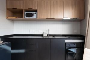 Η κουζίνα ή μικρή κουζίνα στο Monoambiente chic en Cordón Sur