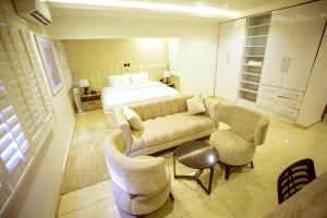 Prostor za sedenje u objektu Tranquil Oasis Hotel