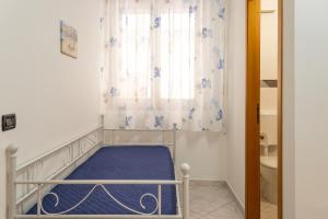 Postel nebo postele na pokoji v ubytování Casa Dolce Casa