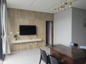 TV a/nebo společenská místnost v ubytování Quarto em Montes Claros