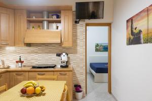 Kuchyň nebo kuchyňský kout v ubytování Casa Dolce Casa