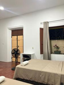 Ένα ή περισσότερα κρεβάτια σε δωμάτιο στο Hostal El Amate #2