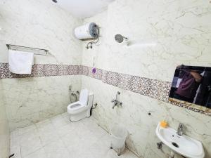 Koupelna v ubytování Hotel Nizamuddin Fab