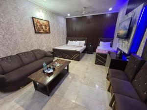 Posezení v ubytování Hotel Nizamuddin Fab