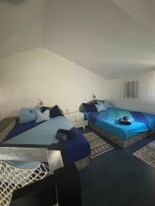 Postel nebo postele na pokoji v ubytování Studio apartman Pepi