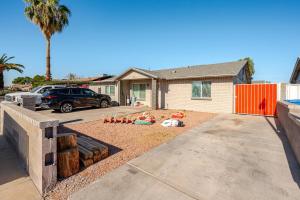 a yard with stuffed animals in a driveway with a house at Phoenix Red Room for Couples in Phoenix