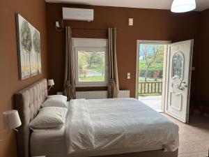 Postel nebo postele na pokoji v ubytování Akrotiri studios + 21 fotografií