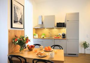 Kuchyň nebo kuchyňský kout v ubytování Jimmys Apartments XXL