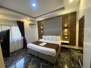 Katil atau katil-katil dalam bilik di PRESKEN HOTELS @FAJODD-4