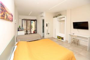 TV a/nebo společenská místnost v ubytování Guest House Rione Cappuccini