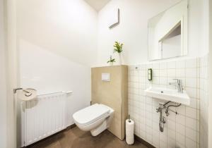 Koupelna v ubytování Jimmys Apartments XXL